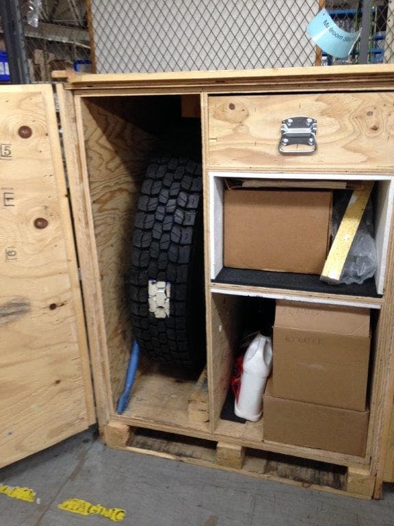 A trade show crate packed with product